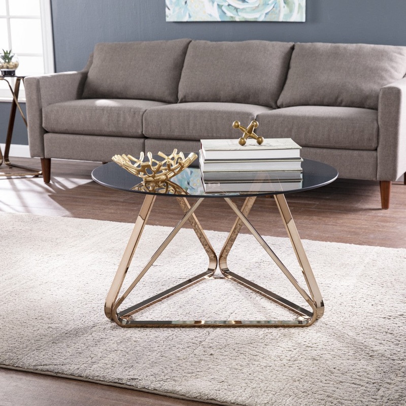 31" Champagne Glass And Metal Round Coffee Table By Homeroots