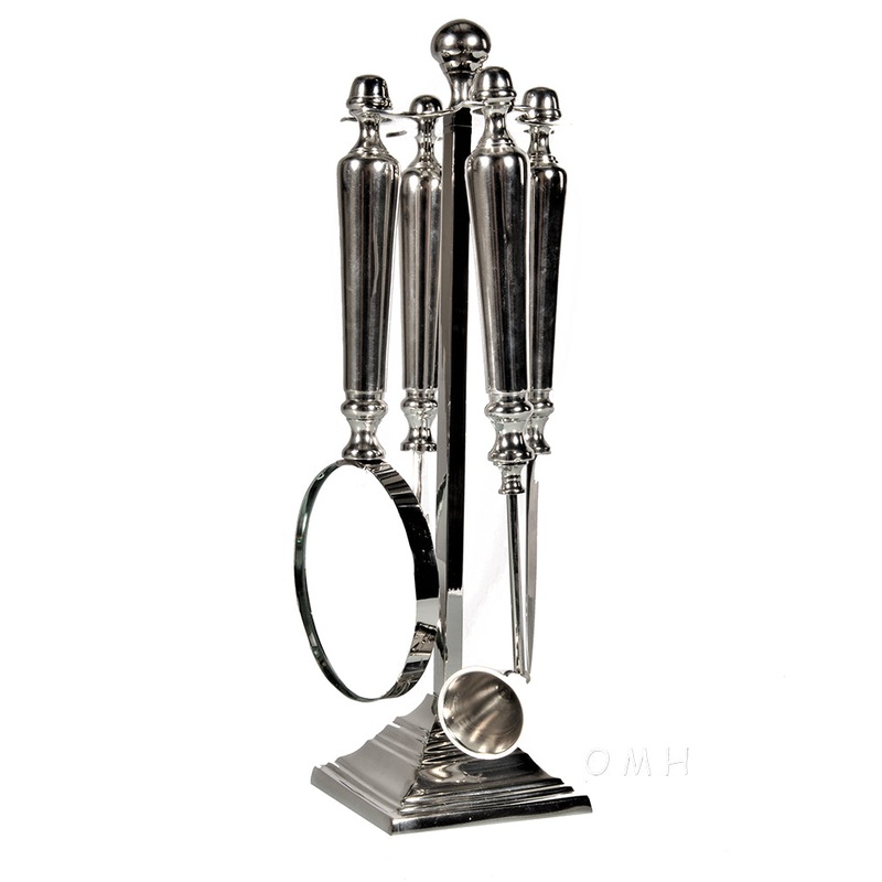 Magnifying glassLetter openerBottle openerand a Candle snuffer Functional Decor By Homeroots